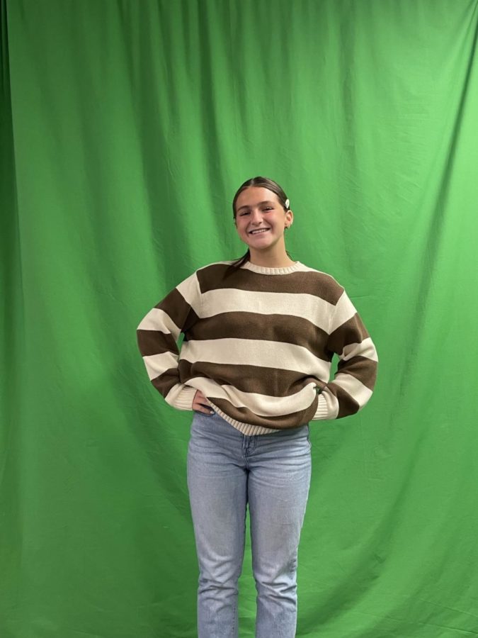 Senior Brecken Hardy shows off one of her favorite sweaters.