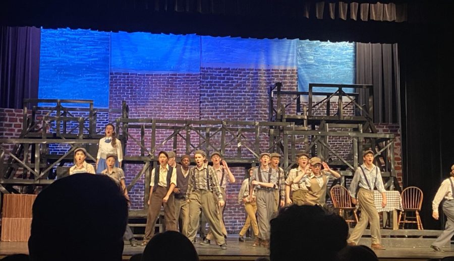 The cast of “Newsies” performs spectacularly in the Eagle High Auditorium.