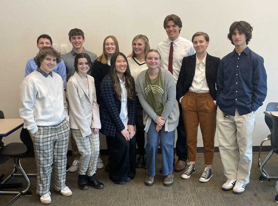 The+Eagle+High+Academic+Decathlon+team+is+a+group+of+highly+intelligent+students+who+showcase+their+talents+at+district+and+state-wide+competitions.+Pictured+are+%28back+row%2C+left-to-right%29+junior+Cole+Yearsley%2C+junior+Roan+Killlian%2C+senior+Hannah+Pease%2C+senior+Elizabeth+Martin%2C+senior+Coston+Fritel%2C+and+%28front+row%2C+left-to-right%29+senior+EJ+Harvey%2C+junior+Belle+Hall%2C+senior+Claire+Desilvia%2C+alumni+decathlete+Emma+Lee%2C+senior+Eden+Schumacher+and+senior+Luca+Fusco.
