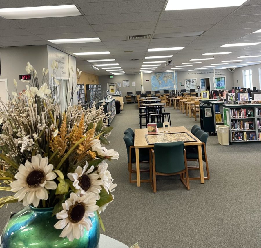 The librarians work hard to fill the space with positive messages and flowers. 