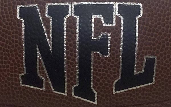 The official NFL football has a unique texture in order for players to grip it effectively. 