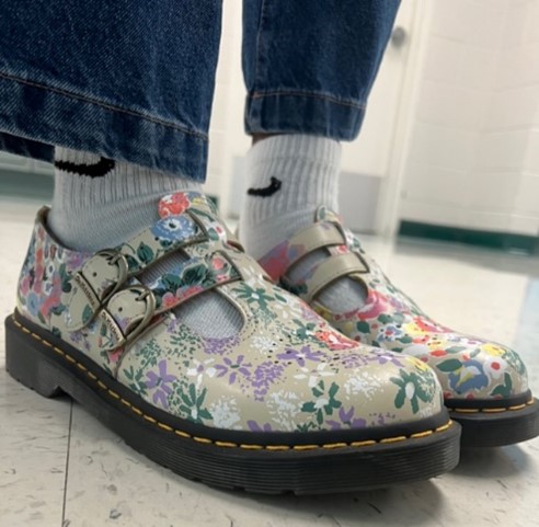 Senior Kerrie Dildine adds a little bit of flare to her outfits with this pair of floral Doc Marten Mary Jane’s. Dildine got the inspiration to buy these shoes from an influencer in Utah and she claims she is currently the only one at school to own them. 