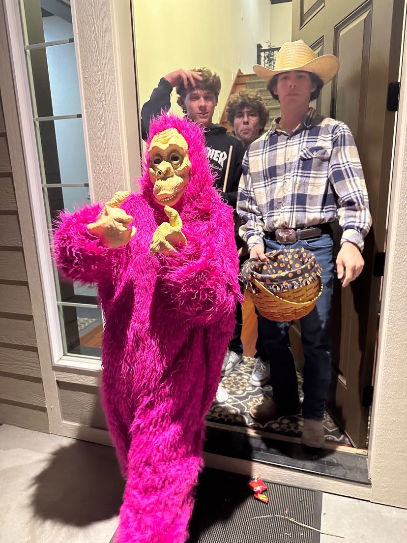 Sophomore Grayson Burch and sophomore Meredith Judge (pictured in the pink suit) show off their Halloween costumes, embracing the fun of Halloween and the effort people put in to making their costumes.
