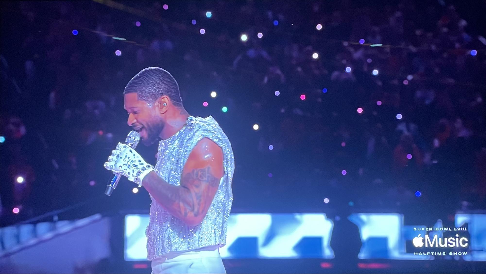 Ushers performance in the halftime show was very impressive. He was putting in so much work into the performance and making the experience amazing for all the fans and it showed by the sweat on his face. 