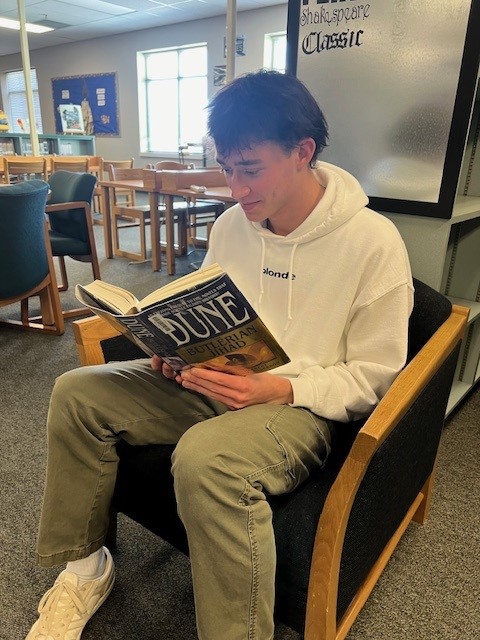 Senior Asher Vittoe reads the written copy of Dune by Frank Herbert. The sequel to the Dune movie reached theatres Mar. 1st, 2024 and surpassed the first film’s U.S. box office total in the first seven days.  