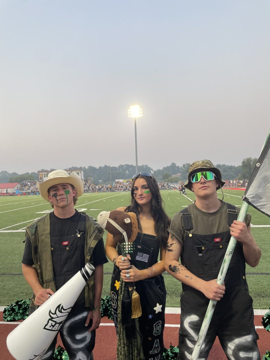 Seniors Gabe Garcia, Aiden Niehaus and Lauren Renner stand in front of the football field at Homedale High. The season kicked off with the Eagle Mustangs versus the Meridian Warriors. The game resulted in a 28-13 Mustangs win. 