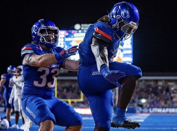 Boise State joining the Pac-12 by Robert Mcpherson: Ashton Jeanty celebrates after he runs in a 12-yard touchdown. He does the same pose that is done for the Heisman Trophy, awarded to the best player in all of college football. Jeanty is currently first in the rankings for the Heisman.