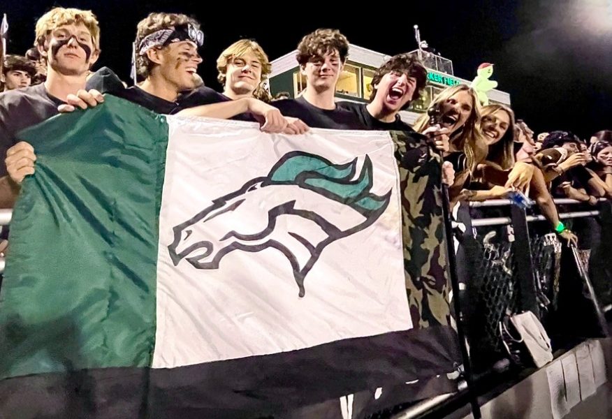 The Eagle High student section is full of school spirit at the homecoming game against Mountain View High. This is Eagle High’s 30th year hosting a homecoming game.