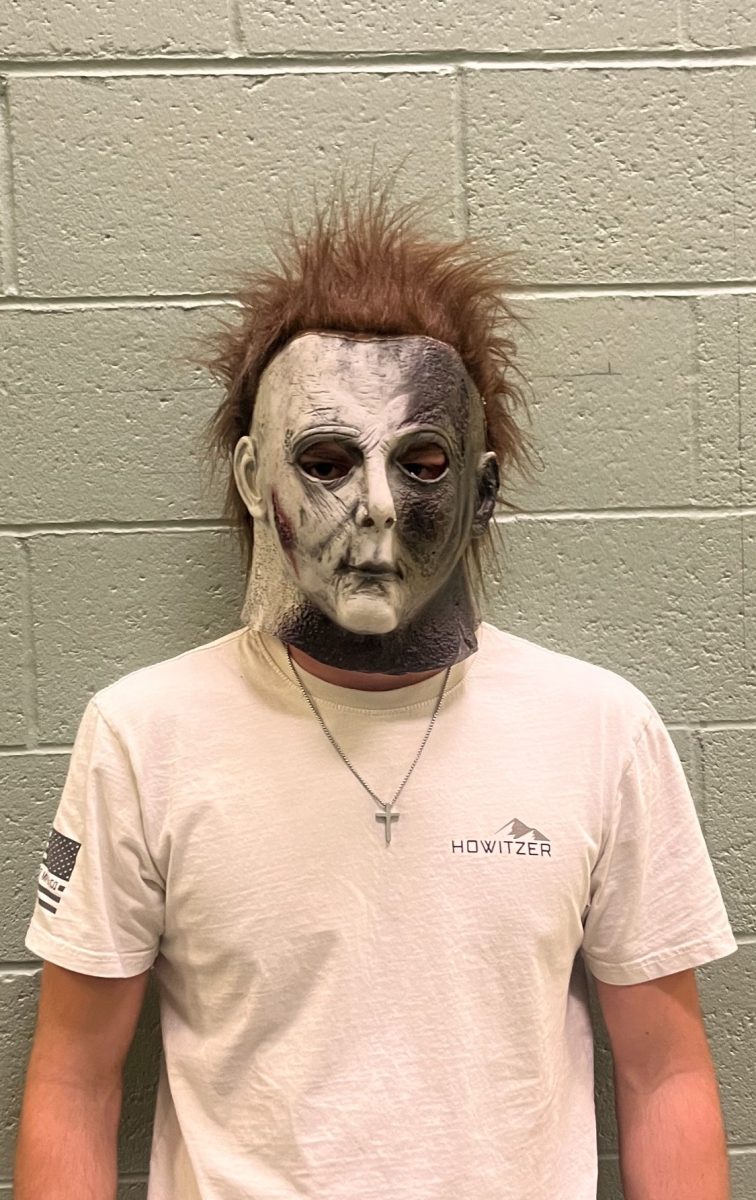 Junior Matthew Hergenreder is dressing up as Michael Meyers for Halloween. He is excited to scare people.