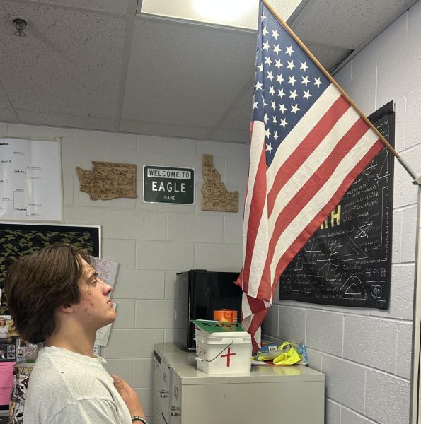 Senior Jack Giannini pledges allegiance to the flag of the United State of America. He shows his support to the many veterans by honoring the flag every day. 