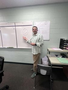 Math teacher Mathew Miller shows his fun teaching technique. He shows the whiteboards his students love to use to benefit their learning experience. 