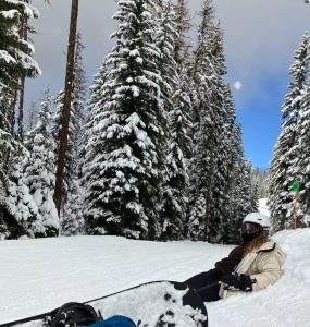  Junior Penelope White hits the slopes at Brundage during winter. The activity is tiring and often requires a rest on a snowbank to catch breath.   