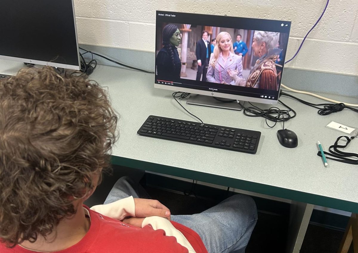 Junior Dylan Frothinger watches the hit movie,”Wicked". He is interested in the wonderful music and production. 