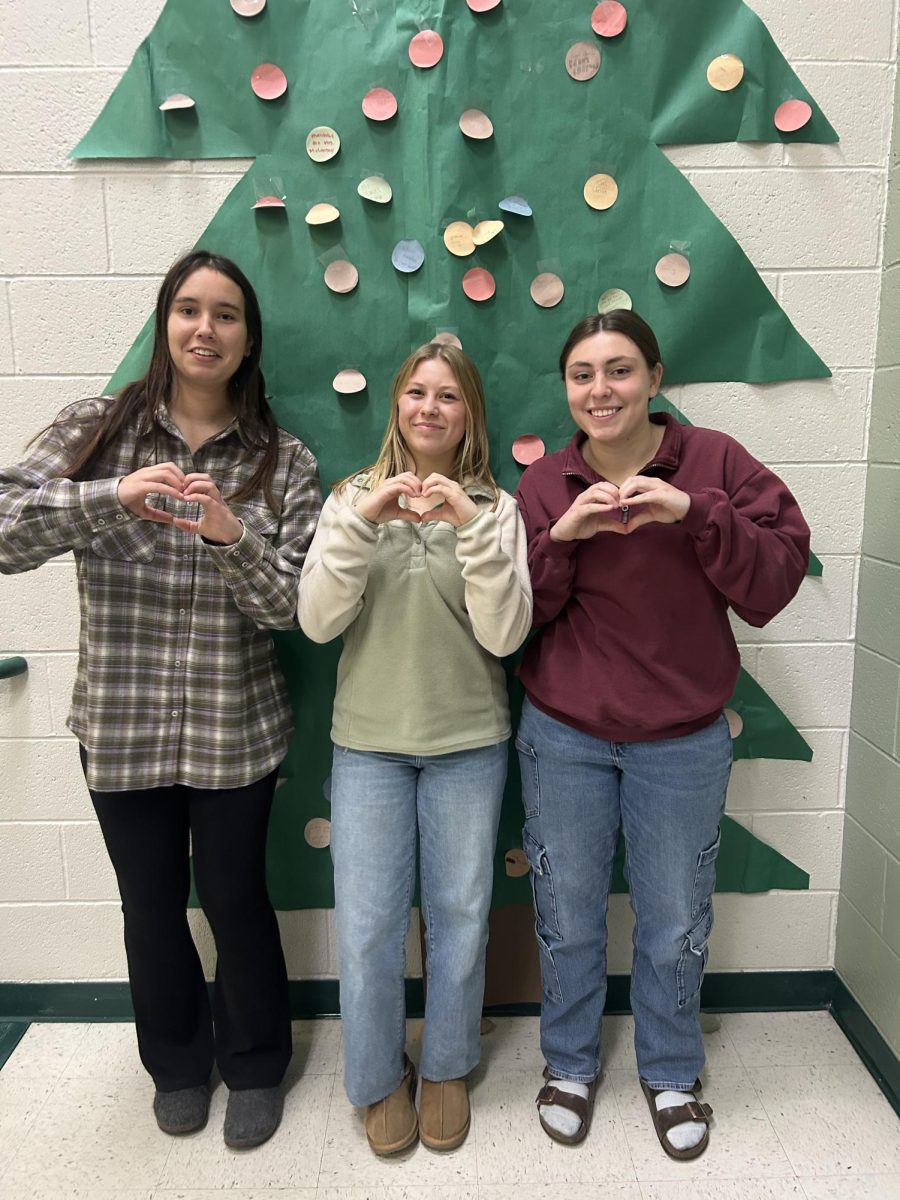 Christmastime brings exciting gifts and friends together. Seniors Gracie Boomgarden, Abbey Nadler and Camryn Hunt all enjoy the gifts they got this year, including new shoes and jewelry. 