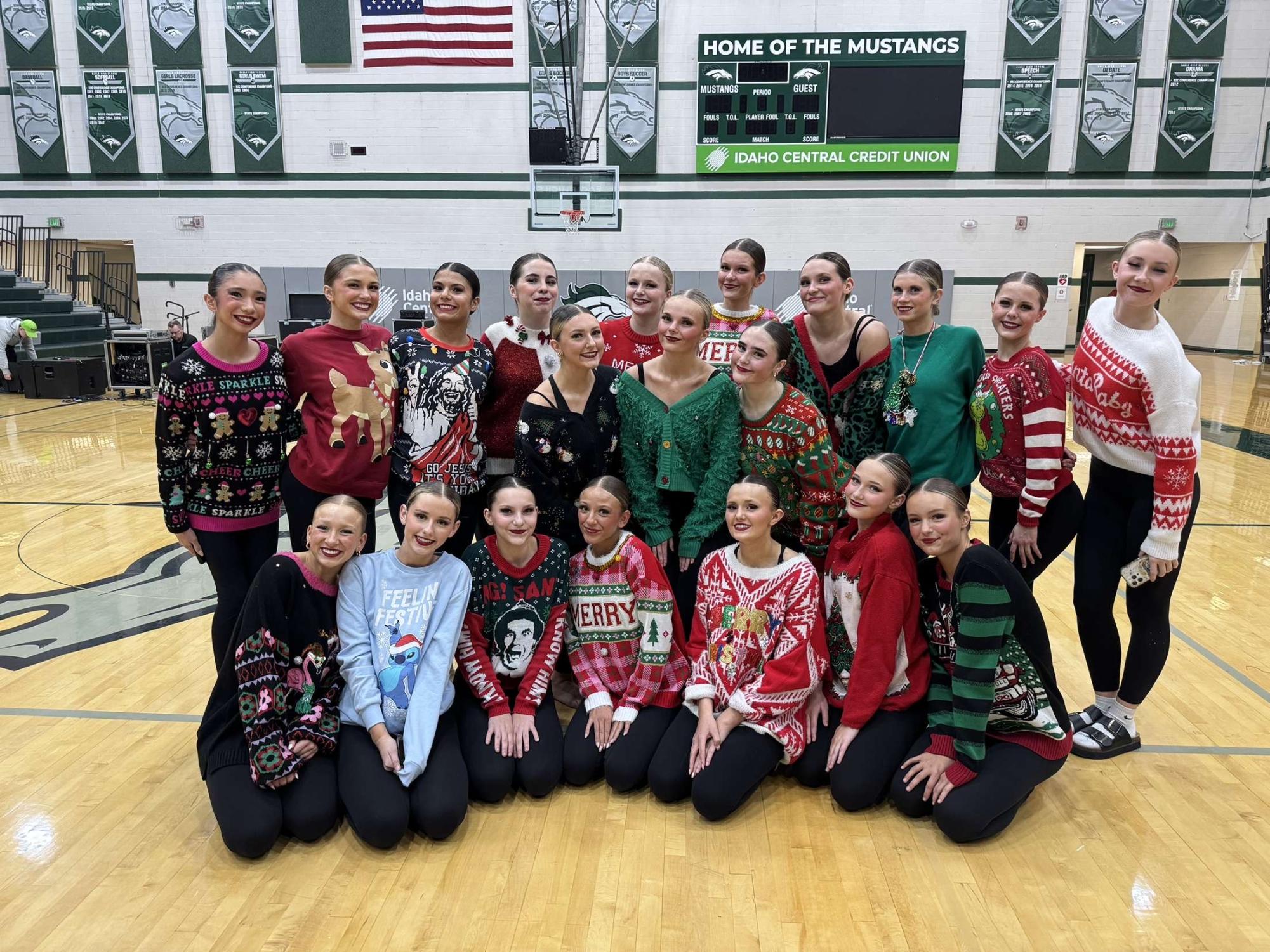 The Eagle High Lightening Dance team takes a team picture after their Dancing with the Mustangs event. The team all dressed in their favorite Christmas sweaters.