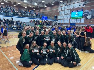 The Eagle High Lightning Dance team holds their runner up prize after the district wide competition held at Sky View High. They performed four group dances previously prepared for the event.