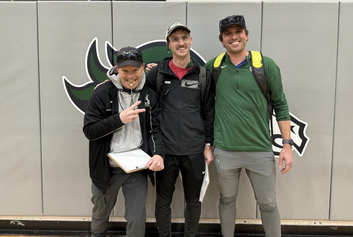 The Eagle High track and field coaching staff are the only coaching staff in the valley in which each member competed in a collegiate sport according to the staff. This gives each coach an understanding of what it means to be a competitor. Coaches Stephen Pratt (left), Matt Mclaughlin (middle) and Nick Hampton (right) stand on the Eagle High basketball court.