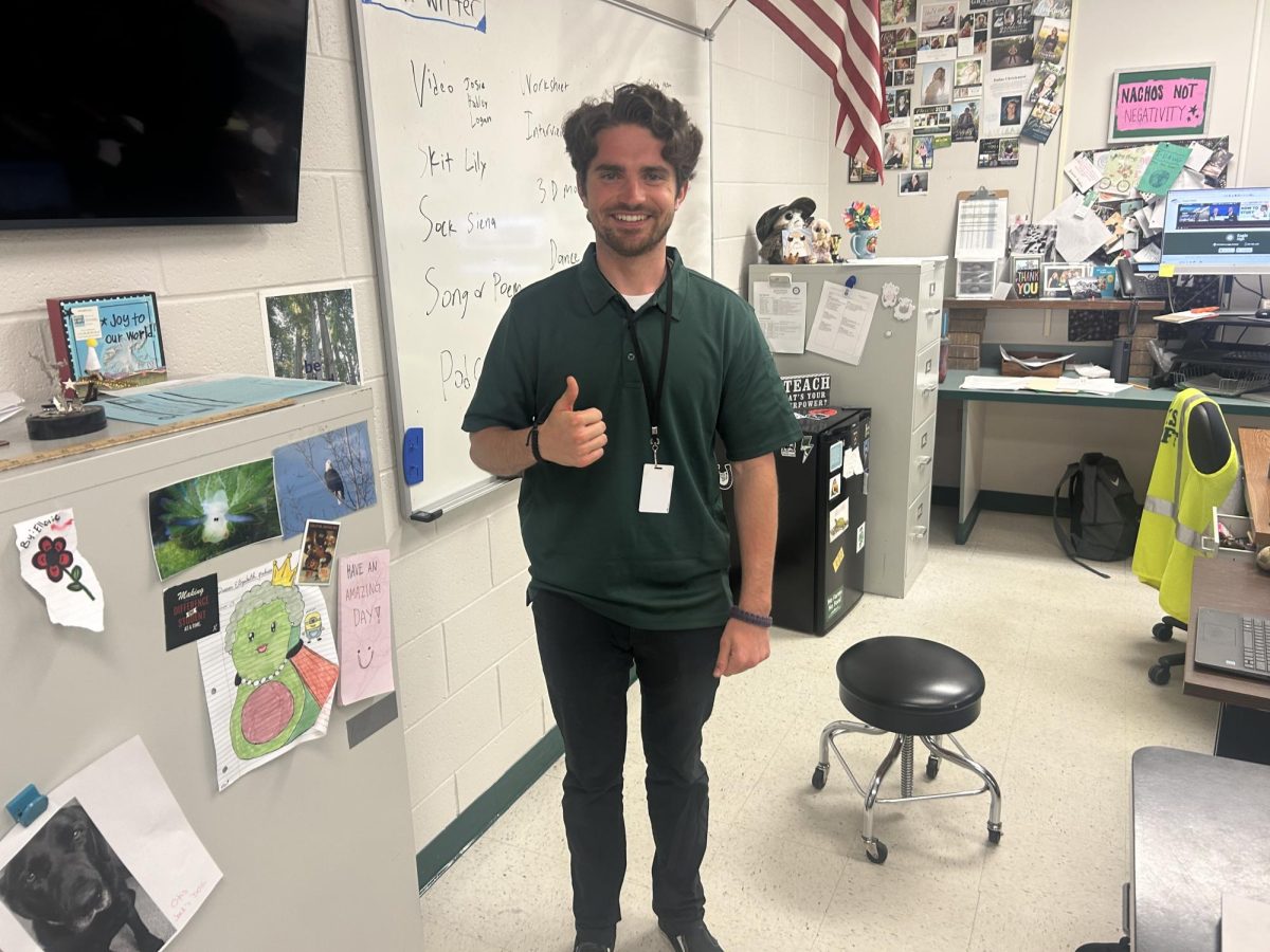 Student teacher Cole Witter shows his love of teaching in the Animal Science and Biology classroom. He is excited to have a classroom of his own next year as he was hired to teach Science. 
