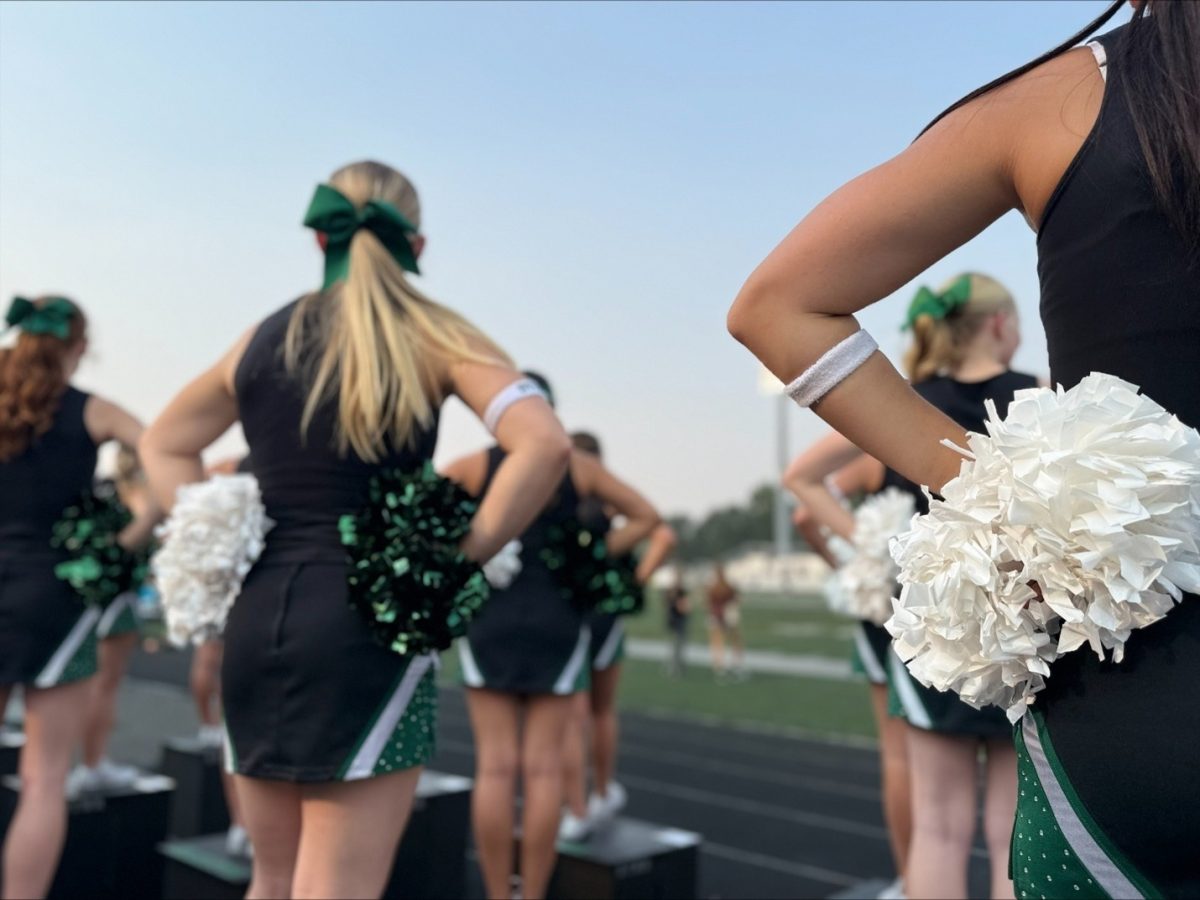 Seniors Maggie Humme, Alaina Tiner and Ava Nicholson face the tension-filled field as the Eagle Mustangs make their way to victory. 