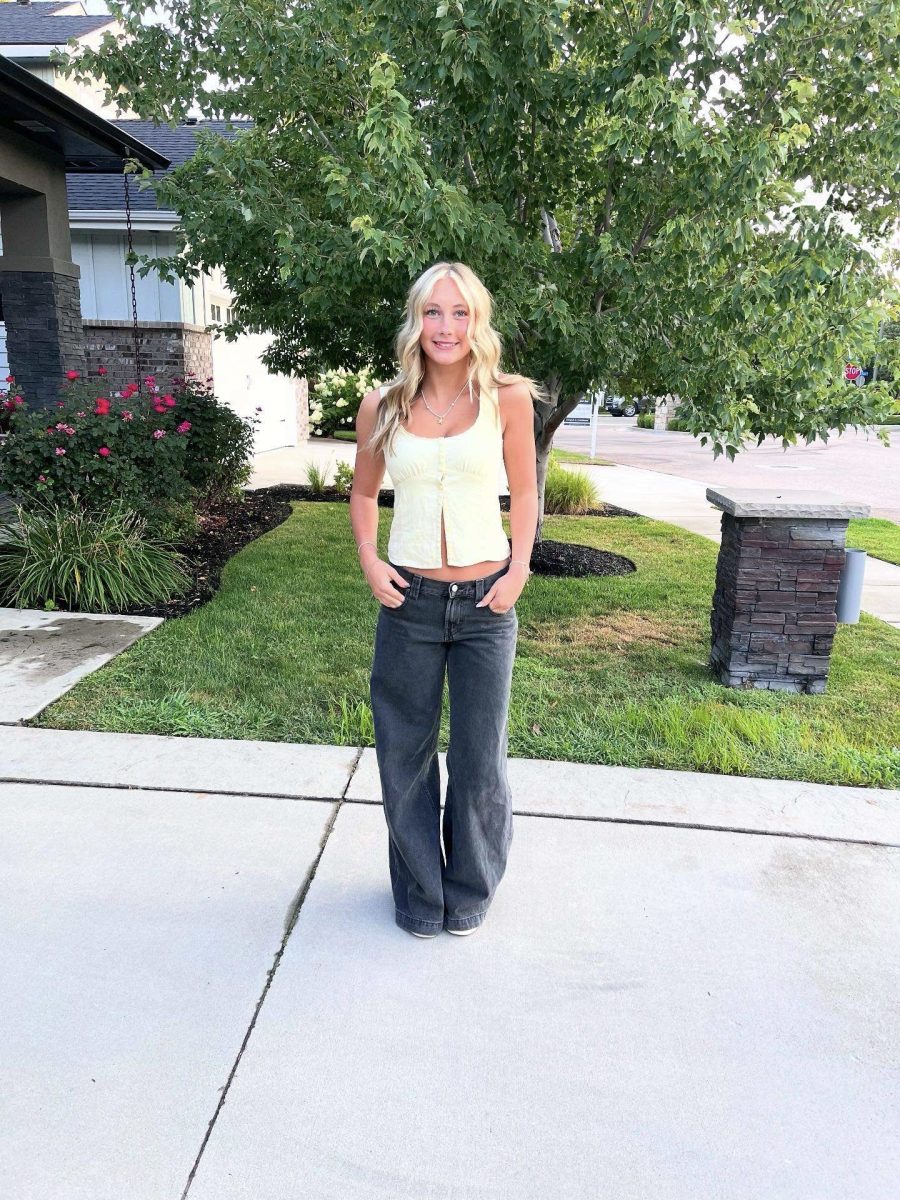Freshman Harper Borst poses for a photo on the first day of school. Borst has met new people and enjoys her new and exciting classes. 