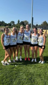 The Eagle High cross country team had their first meet on Aug. 30. It took place at Bishop Kelly High. Senior Andie Roy, junior Betsy Reeder and seniors Lucy Hansen, Anna Glen and Josie Roy all had high spirits after their performance at the race. 
