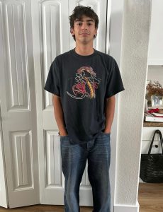 Senior Zion Gomez poses for his last, first day of school picture. He awaits his high school graduation and all the exciting events leading to the closing of his high school experience.  
