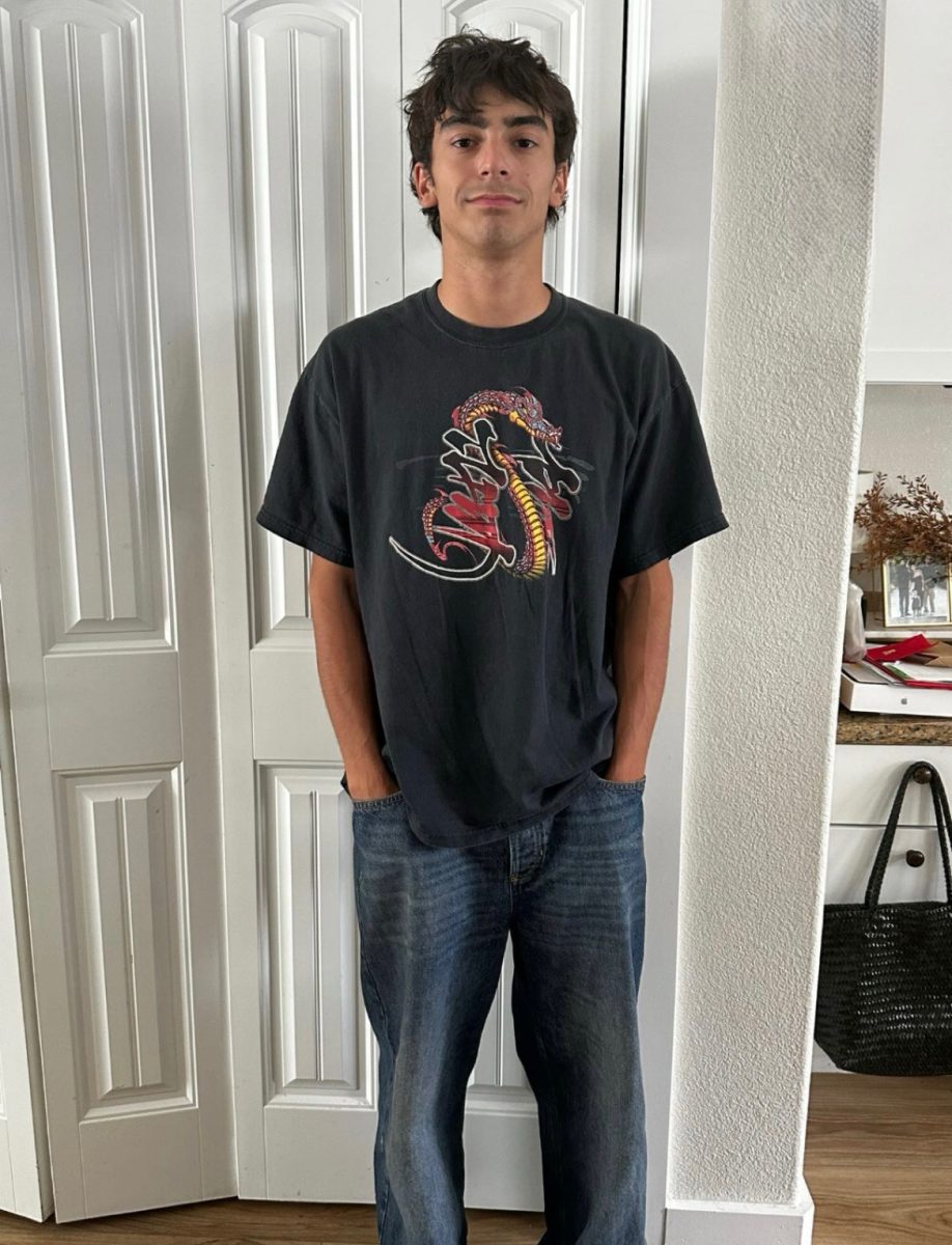 Senior Zion Gomez poses for his last, first day of school picture. He awaits his high school graduation and all the exciting events leading to the closing of his high school experience.  