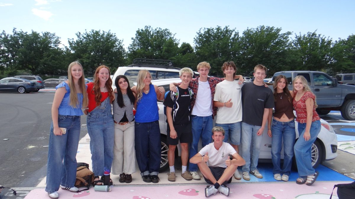 As summer ends and the school year begins, many students are sad about the change, while some are excited for the school year and fall to start. A group of friends at Eagle High school, enthusiastic about the new school year, pose for a photo on the first day school.  