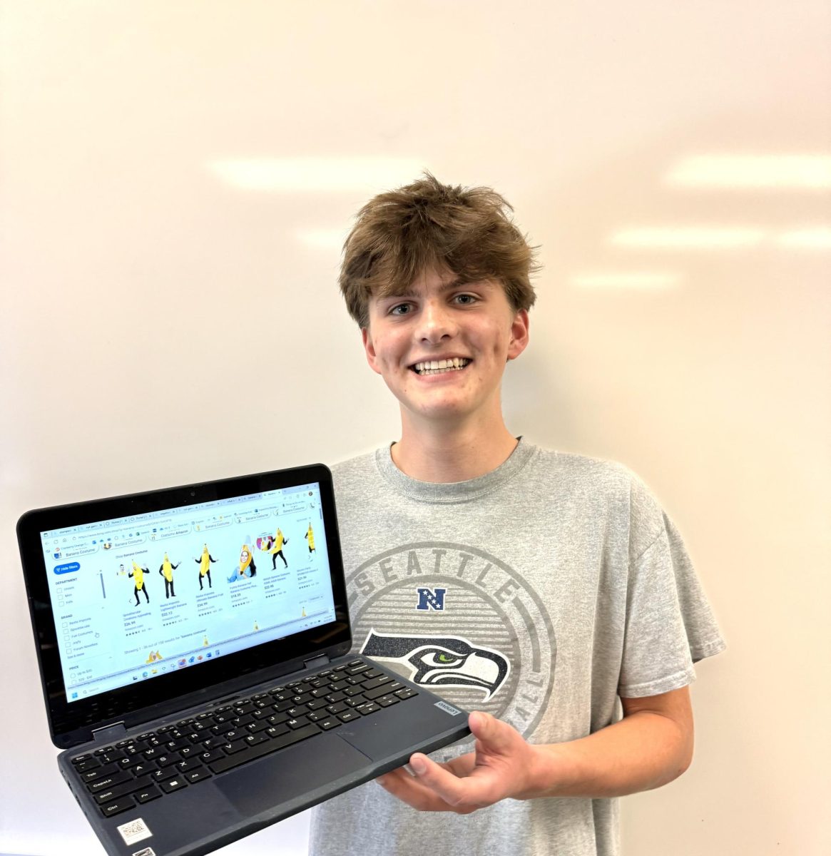 Junior Wes Anderson searches for banana costumes online to prepare for Halloween. This is one of many fun and creative costumes students plan to wear this year. 