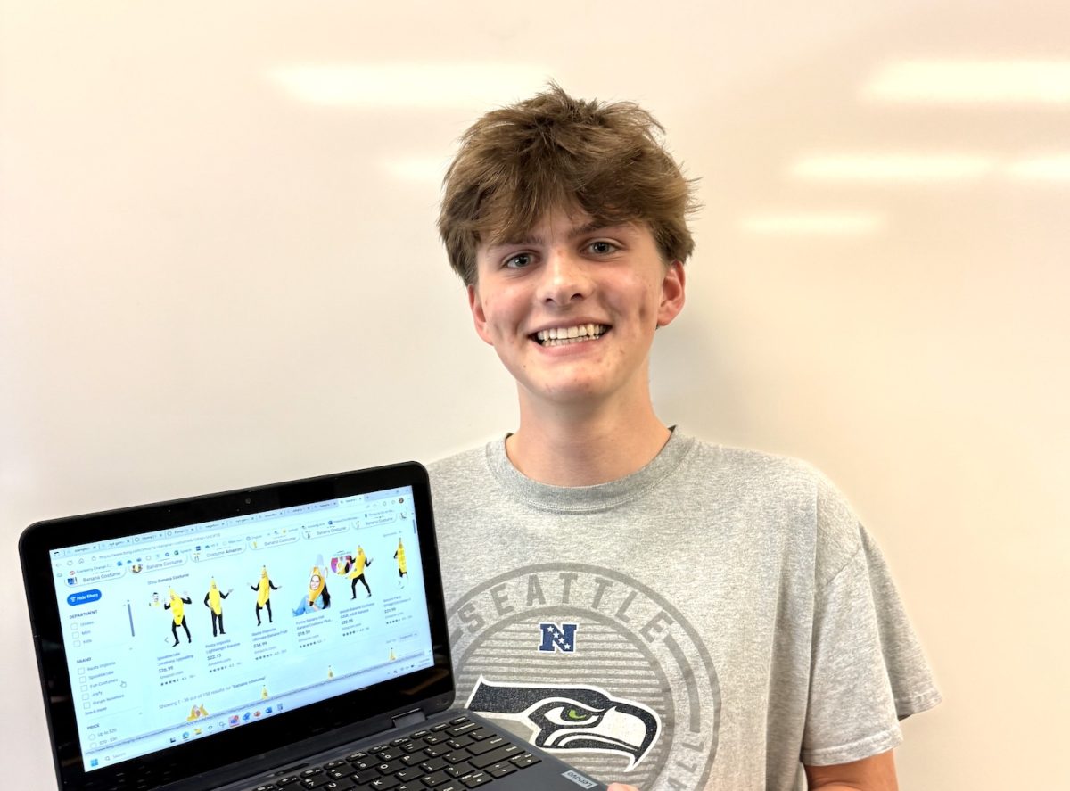Junior Wes Anderson searches for banana costumes online to prepare for Halloween. This is one of many fun and creative costumes students plan to wear this year. 