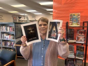 Eagle High English teacher Shelli Taylor shows off the new up and coming scary movie options. These new releases are just what she needs to get in the spooky Halloween spirit. 