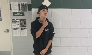 Sophomore Colin Keltch pauses to consider his next fantasy football pick. He tries his best to keep his team alive and so far and he averages one in three. 