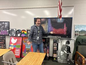 Teacher Mike Corbett not only is a well-loved teacher of History of Rock and Roll, but he also flies planes in his free time.