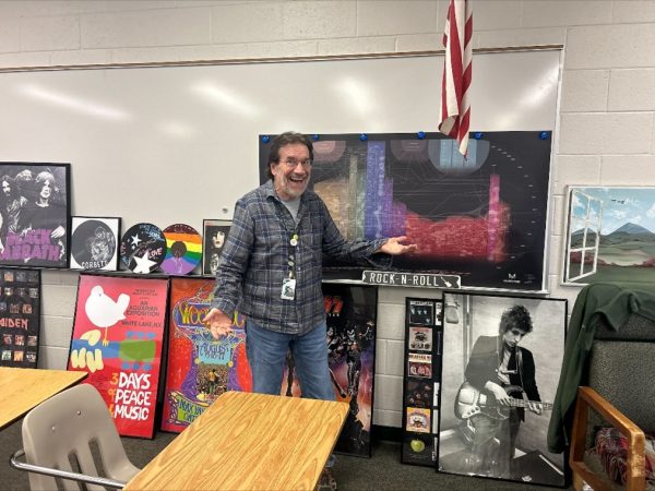 Teacher Mike Corbett not only is a well-loved teacher of History of Rock and Roll, but he also flies planes in his free time.
