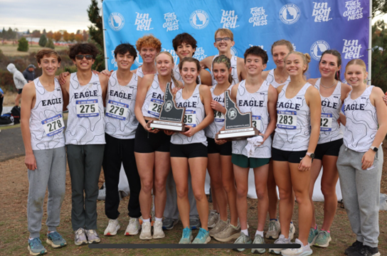 Eagle High’s cross-country team celebrates the boys for winning the 6A SIC District Championship. The team looks forward to the 6A State cross country meet in Lewiston.