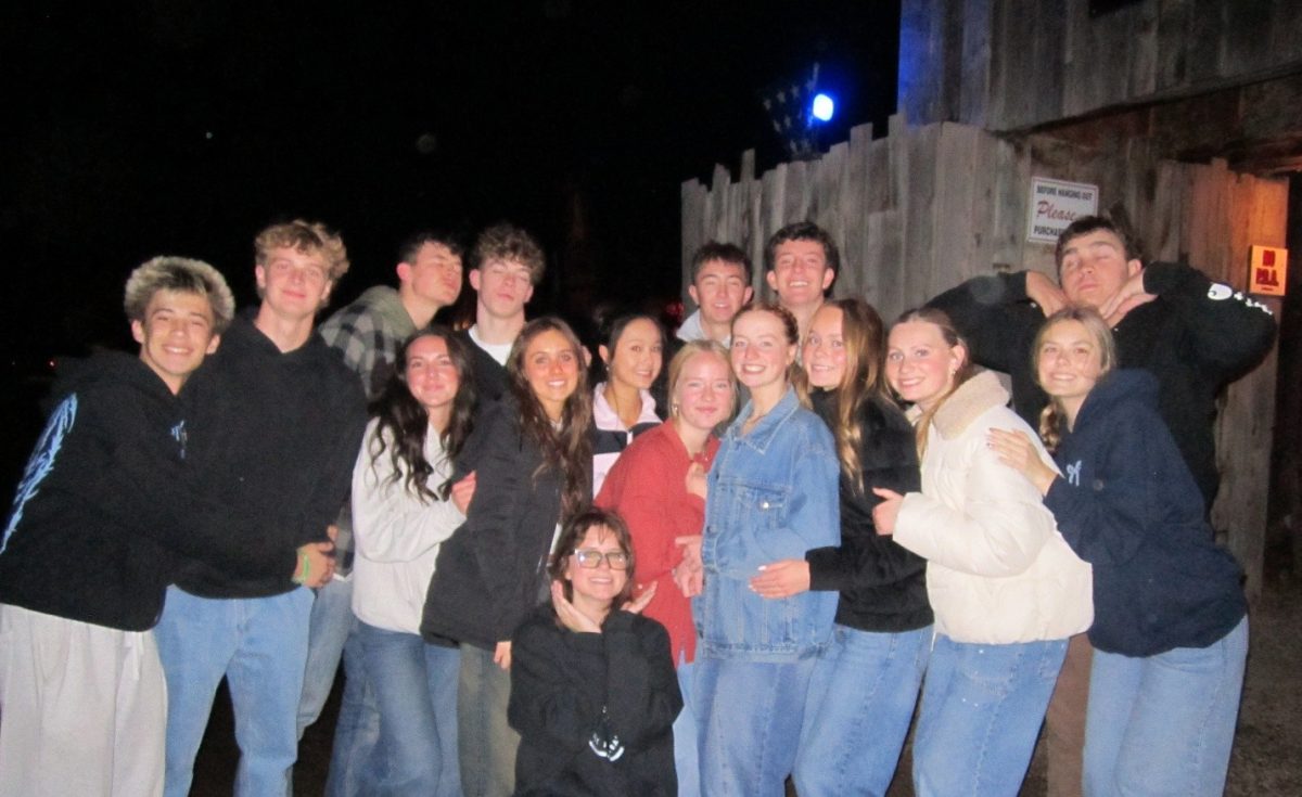 Eagle High students look back at their favorite times throughout their year. Senior Ozzie Faulk (second from left) shares one of his favorite times during the Halloween season at Haunted World with some of his closest friends.