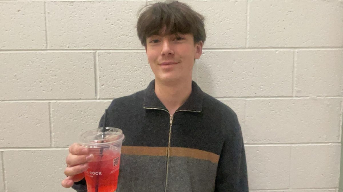 Senior Lucas Reese holds a drink from Black Rock Coffee House. This is a popular lunch destination for Eagle High Students. Black Rock Coffee House is one of many places bringing seasonal drinks to Eagle High Students. ​