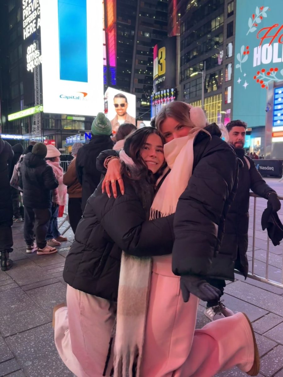 Seniors Sienna MeGee and Makenna Martin celebrate the New Year in Times Square, New York City. Like many students, they prepare for this night weeks in advance to guarantee they have a memorable night and set the tone for the new year. 