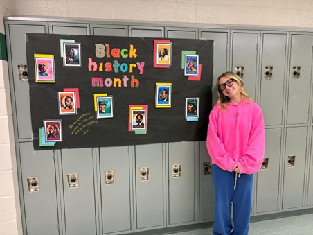 Senior London Sanfilippo-Cook creates a poster to show off in the Eagle High hallways. The poster is inspired by English teacher and yearbook advisor Cynthia Labenski’s idea to brighten the school and support Black History Month. 
