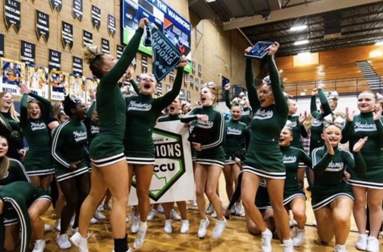 The Eagle High Cheer Team celebrates their 2x 6A DIII District Champion title with pure excitement and joy. The team’s hard work and dedication have made them state bound with getting first in show, sideline and second in pom.   