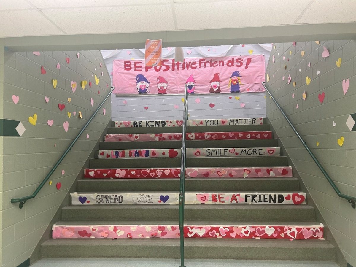 Sources of Strength creates a festive entrance to one of Eagle High’s staircases. It is a sneak peak of their photo booth to come.