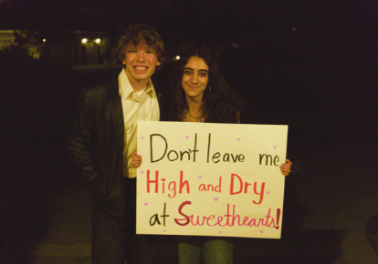 Junior Aidan Marshall gets asked to the annual Sweethearts dance by sophomore Emma Ada with a handmade sign. The sign is referring to the iconic Radiohead song “High and Dry.” Personal, handicraft posters are a common theme when a guy is being asked to a dance.