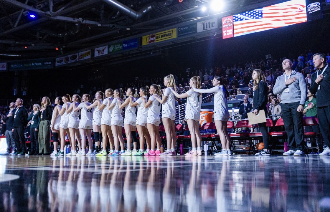 The Eagle high women’s varsity basketball team line up for the Pledge of Allegiance before the State Championship game. Teams do this before games to truly unify as a nation and team.