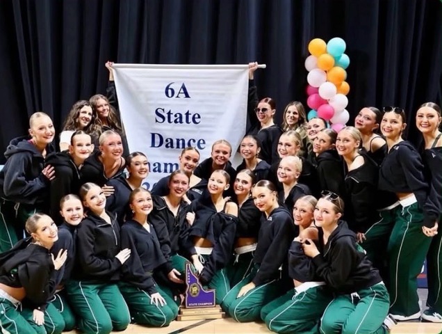 Eagle Lightning Dance team celebrates their State win at the Mountain America Center in Idaho Falls this past weekend. The coaches pictured, Christina Shell and Delaney Schow, led the girls to their victory. All 27 dancers worked vigorously the entire season to earn this outcome.  