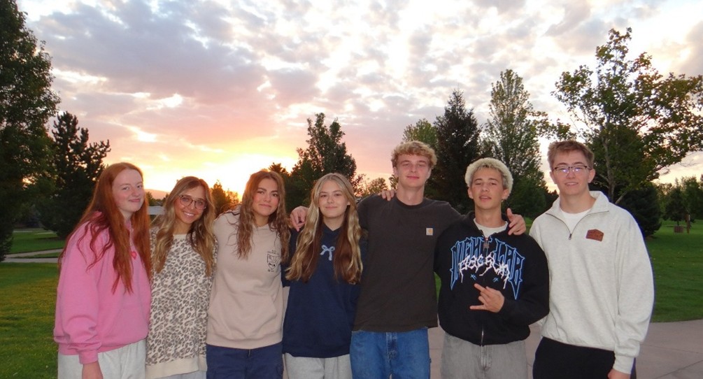 Seniors Audrey Baxter, Ava Sonne, Maddie Dalling, Allyson Godfrey, Ozzie Faulk, Will Anderson and Curtis Hansen (pictured left to right), attend the class of 2026’s Senior Sunrise. These same friends look forward to Senior Sunset as it will end this chapter in their life.